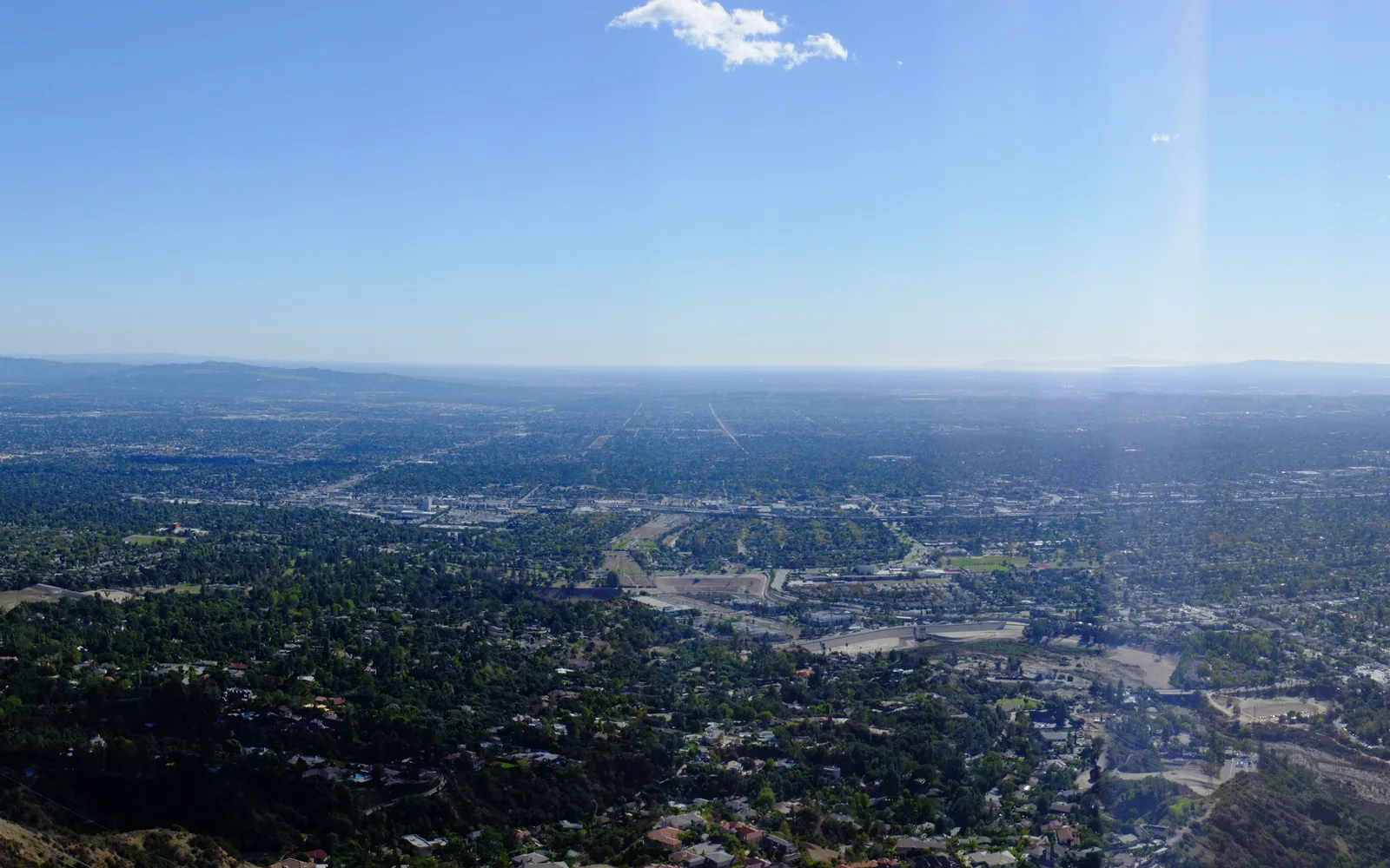 Panoramic view of the San Gabriel Valley from Henninger Flats, showing Pasadena, Altadena, and the valley landscape with mountains